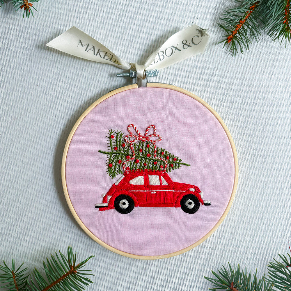 
                      
                        Cheerful Christmas Car Embroidery
                      
                    