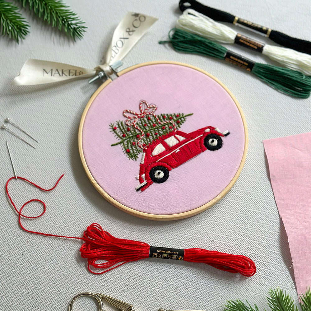 
                      
                        Cheerful Christmas Car Embroidery
                      
                    