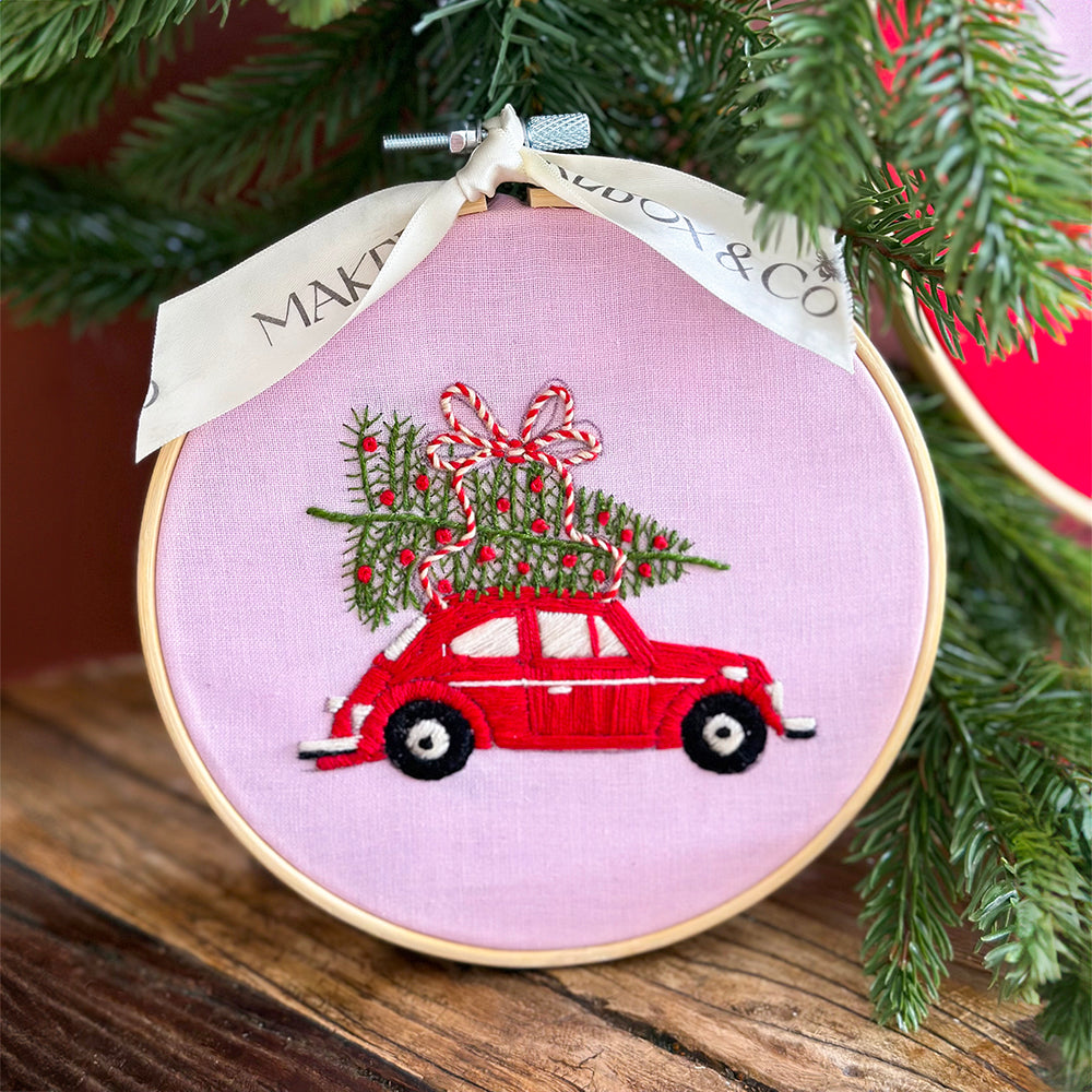 
                      
                        Cheerful Christmas Car Embroidery
                      
                    